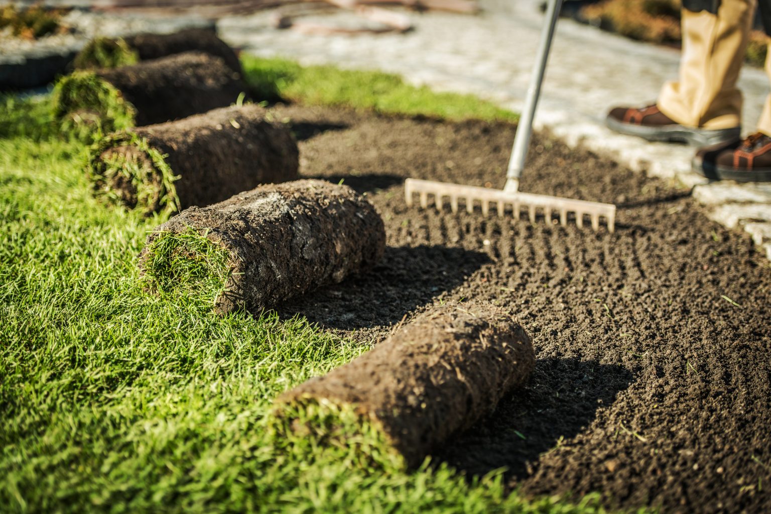 Ground preparation before sod installation